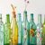 Upcycling butelek szklanych na dekoracje: praktyczne wskazówki, by cieszyć się nimi latami